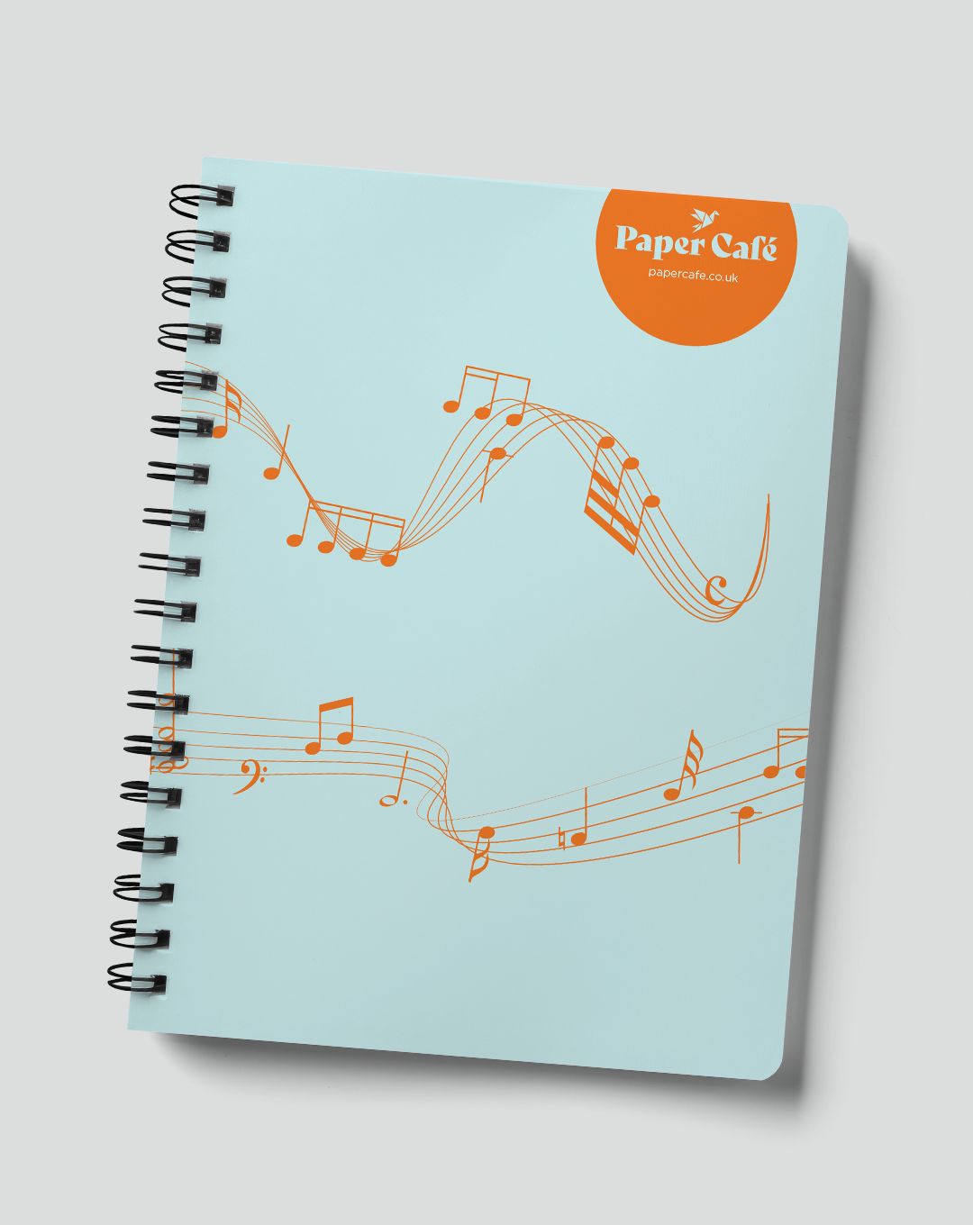 Paper Cafe music books featuring lined and manuscript pages – crafted for musicians and songwriters.